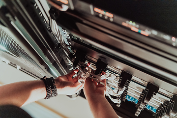 Image showing Close up of technician setting up network in server room