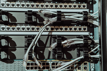 Image showing Close up of technician setting up network in server room