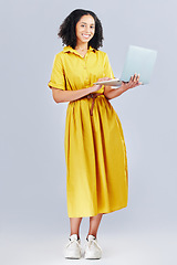 Image showing Happy, blog and portrait of a woman with a laptop for communication, email or internet. Smile, technology and a girl or employee typing on a computer online for work isolated on a studio background