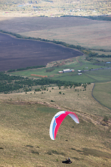 Image showing Paragliding in mountains