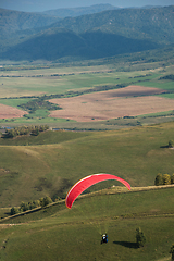 Image showing Paragliding in mountains