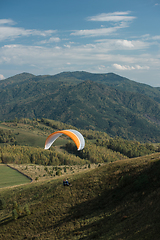 Image showing Paragliding in mountains