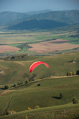 Image showing Paragliding in mountains