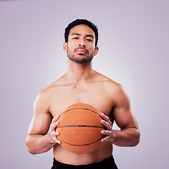 Image showing Portrait, fitness and basketball with a serious man in studio on gray background for training or a game. Exercise, workout or sports and a shirtless young male athlete holding a ball with confidence