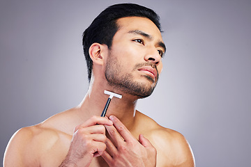 Image showing Beard hair, razor and face of man with bathroom routine, self care treatment, relax facial grooming or cosmetics skincare. Neck cleaning, hygiene wellness and studio person shaving on grey background