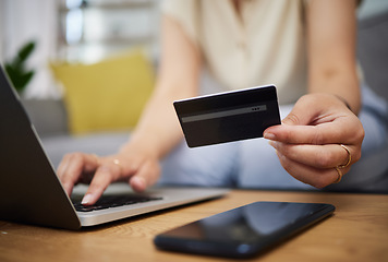 Image showing Hands, credit card and ecommerce on laptop in home for digital payment, fintech password and online shopping. Closeup of person, computer and customer banking for financial bills, budget and account