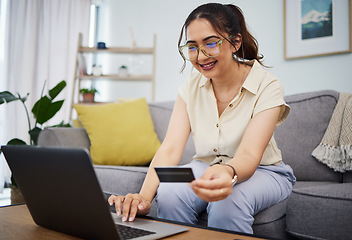 Image showing Woman, credit card and online shopping on laptop in home for digital payment, fintech and ecommerce. Happy female person, computer and internet banking for financial sales, password and web account