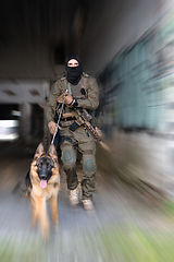 Image showing Modern Warfare Soldiers with military working dog in action on the battlefield.