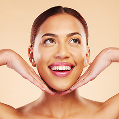 Image showing Skincare, beauty hands and face of woman in studio isolated on a brown background. Cosmetics, happy and natural model with spa facial treatment for dermatology, aesthetic and wellness for skin health