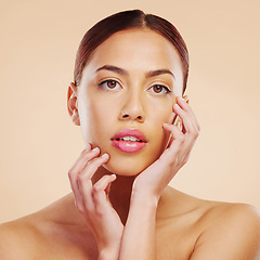 Image showing Portrait, skincare and woman with cosmetics, dermatology and luxury against a brown studio background. Face detox, female person or model with makeup, aesthetic or wellness with health, glow or shine