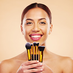 Image showing Makeup, brush and portrait of woman with cosmetic beauty product for skincare isolated in a studio brown background. Eyelid, elegant and powder for cosmetology aesthetic, glow and soft skin glamour