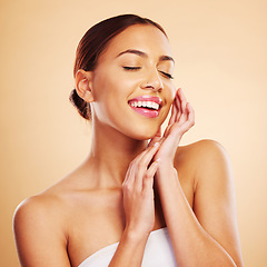 Image showing Relax, smile or natural face of happy woman in studio isolated on brown background for skincare. Facial treatment, beauty grooming or zen girl model relaxing with glow, shine or self care cosmetics