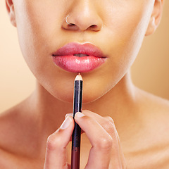 Image showing Mouth, woman or closeup of lip pencil for makeup, facial skincare or beauty cosmetics in studio. Hand, model or person with lipstick product to outline lips, aesthetic makeover and color application