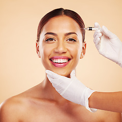 Image showing Portrait, happy woman or plastic surgery with a needle, cosmetics isolated on studio background. Hands, forehead or face of model with injection, smile or beauty in dermatology medical procedure