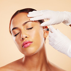 Image showing Hands, woman or plastic surgery with needle for facelift or cosmetics isolated on studio background. Cheek, anti aging or girl model with injection, dermatology and beauty glow in medical procedure