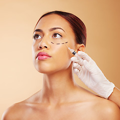 Image showing Ophthalmic, plastic surgery and face of woman with beauty facial for isolated in brown studio background. Skincare, cosmetics and young person with syringe for treatment or medical transformation