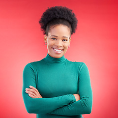Image showing Happy, portrait and a black woman in studio with arms crossed, confidence and a positive mindset. Fashion, smile and african female model person in casual clothes on a red background for motivation