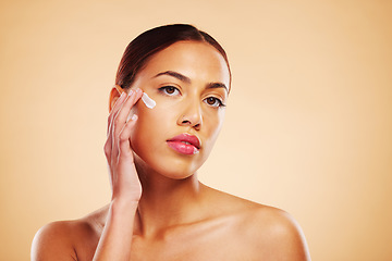 Image showing Skincare, portrait or woman with face cream or sunscreen product in grooming routine with cosmetics. Dermatology, studio background or beauty model applying natural facial creme lotion moisturizer