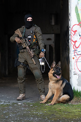 Image showing Modern Warfare Soldiers with military working dog in action on the battlefield.