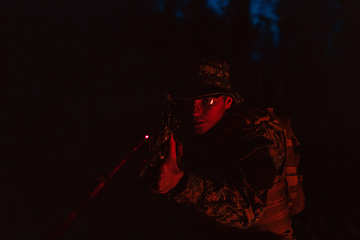 Image showing Soldiers squad in action on night mission using laser sight beam lights military team concept