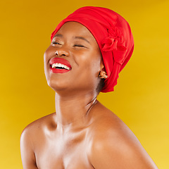 Image showing Beauty, African and black woman with makeup and head wrap with smile isolated in yellow studio background. Happy, skin and skincare by young female person scarf for dermatology, wellness or cosmetics