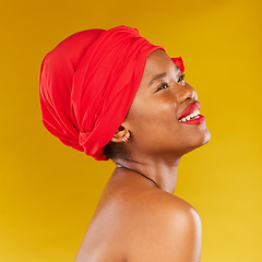 Image showing Beauty, thinking and African woman with makeup and head wrap with smile isolated in yellow studio background. Happy, skin and skincare by young person scarf for dermatology, wellness or cosmetic