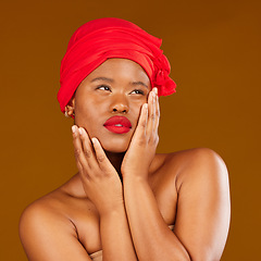 Image showing Woman, face and hair scarf with skincare beauty, makeup and haircare in studio. Brown background, African female person and cosmetics of a model with head wrap for culture with dermatology glow