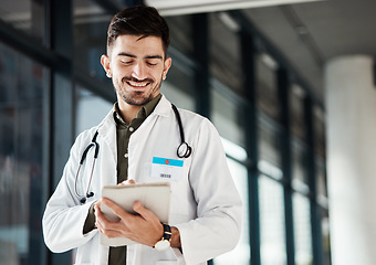 Image showing Happy, doctor and man with tablet in hospital for Telehealth, advice and social chat or research. Healthcare, news and male health expert smile for online, website or internet communication at clinic