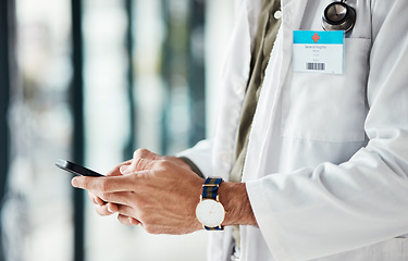 Image showing Phone, hands and man doctor typing message, social media or planning online schedule in a hospital. Telehealth, search and male healthcare expert with smartphone for advice, chat or research check