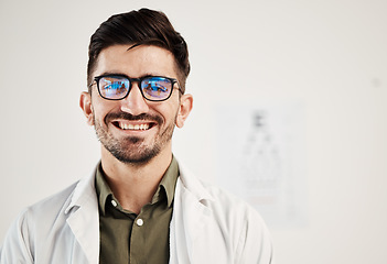 Image showing Eye exam, smile and portrait of man optometrist with confidence, glasses and friendly service in consultation office. Ophthalmology, face and happy male eye expert proud of vision testing career