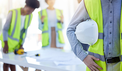 Image showing Construction worker, closeup and helmet with arm of engineer, builder or contractor. Industrial team, handyman gear and person with protection and safety for engineering and architecture project