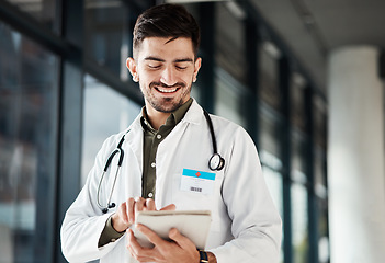 Image showing Happy, man and doctor with tablet in hospital for Telehealth, advice and social chat or research. Healthcare, news and male health expert smile for online, website or internet communication at clinic