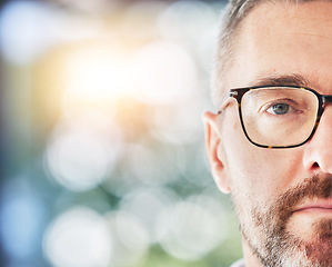 Image showing Glasses, optometry and portrait with eye of man with eyewear, spectacles and optician with bokeh. Half, face and male person with stylish frame, vision from optometrist and eyesight with mockup space