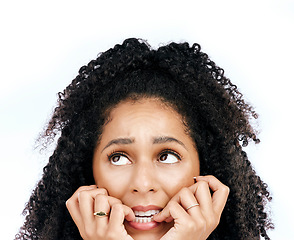 Image showing Bite nails, thinking and face of woman on a white background for worry, doubt and uncertain. Anxiety, confused and female person worried, anxious and unsure for problem, crisis and choice in studio