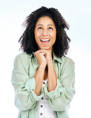 Image showing Hope, woman and smile looking above for model, luck and gratitude feeling excited in studio. Thank you, happy and blessing hand gesture with a female person with white background and forgiveness