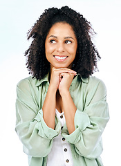 Image showing Thinking, smile and hope with a woman in studio isolated on a white background to wish or pray. Idea, dream and excited with a happy young female person looking or feeling positive in anticipation