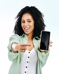 Image showing Phone screen, woman portrait and hand pointing in studio for deal, sale or sign up steps on white background. Smile, finger and face of female with smartphone display, good news and app review