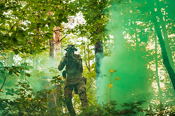 Image showing Battle of the military in the war. Military troops in the smoke