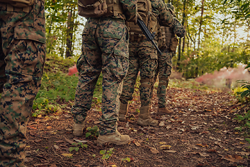 Image showing Modern warfare Soldiers Squad Running as Team in Battle Formation