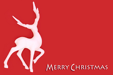 Image showing Merry Christmas White Reindeer on Red Background