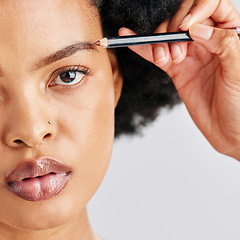 Image showing Makeup, pencil and eyebrow of black woman with beauty or eyeliner cosmetic product application for self care and cosmetology. African person and closeup of face isolated in studio white background