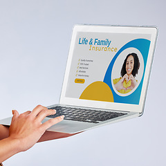 Image showing Laptop, hands and insurance website with a customer in studio on gray background for life cover sign up. Computer, security or internet with a female person searching for information about protection