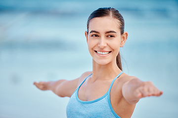 Image showing Fitness, yoga and face of woman by beach with warrior pose for wellness, healthy body and energy. Sports, nature and female person stretching arms for exercise, training and balance workout by ocean