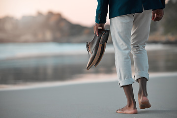 Image showing Walking, beach and feet of business man for journey on holiday, vacation and freedom by ocean. Professional, travel and male entrepreneur with shoes for calm, peace and relax in nature at sunset