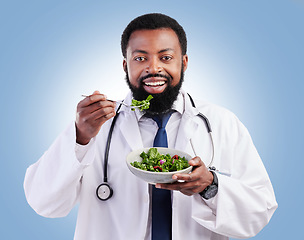 Image showing Happy black man, portrait and salad for doctor weight loss, vegan healthcare diet or medical advice for wellness food. Vegetables bowl, nutritionist studio or African person eating on blue background