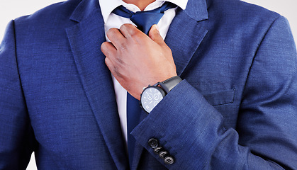 Image showing Business, man and fixing tie for fashion, professional clothes and corporate trader in studio. Closeup of male model, executive CEO and salesman in suit for style, pride and ready for job interview