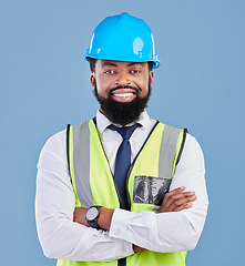 Image showing Engineer, happy black man and portrait with arms crossed in studio for building inspection, renovation or industrial management. Male architect, contractor and construction manager on blue background