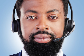 Image showing Customer service portrait, studio black man and serious consultant for tech support, help desk administration or telecom. Call center profile picture, face and African person face on blue background