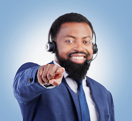 Image showing Customer service portrait, happy black man or hand pointing at you, telemarketing choice or insurance agent with promotion decision. Studio face, career job or African person smile on blue background