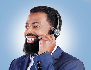 Image showing Customer service headset, happy black man and consulting about ecommerce service, help desk advice or contact us. Telemarketing, studio face or African person talking on microphone on blue background